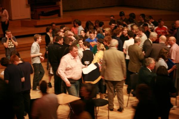 The Melee - conductor with trophy